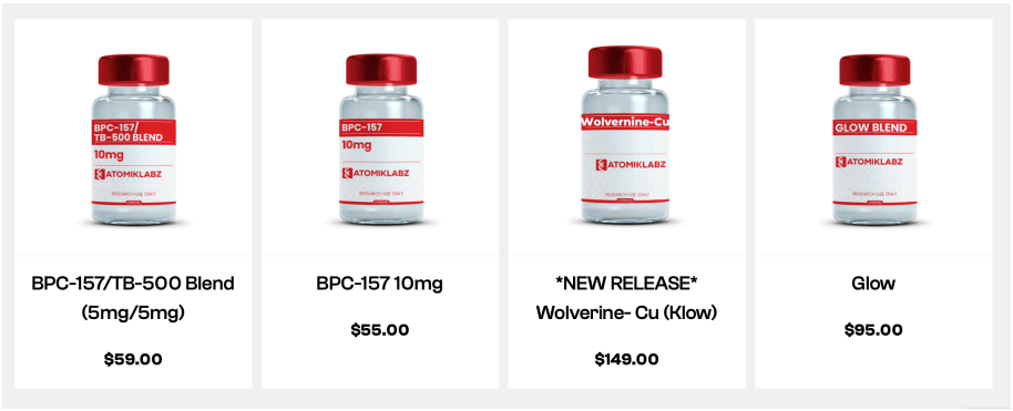 Four Atomik Labz peptide supplement vials including BPC-157, TB-500 blend, Wolverine-Cu, and Glow.